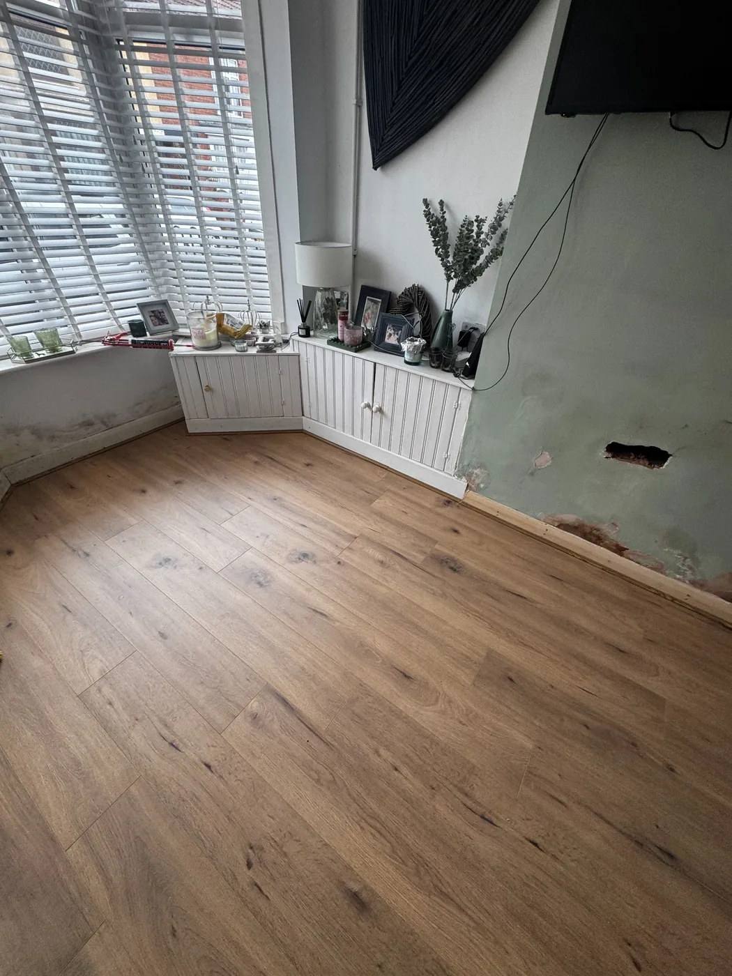 Wood-look flooring fitted in a bright room