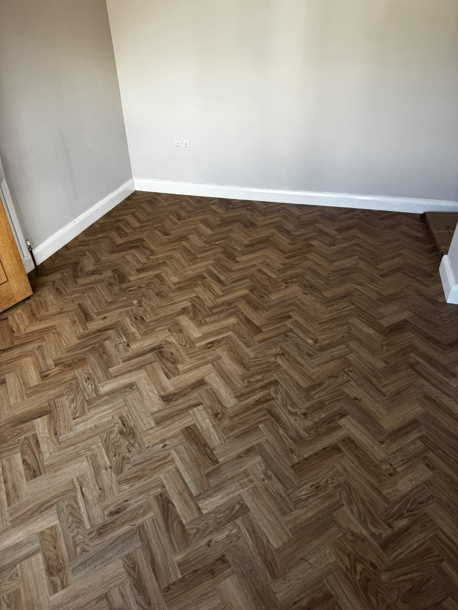 Herringbone LVT flooring in a room